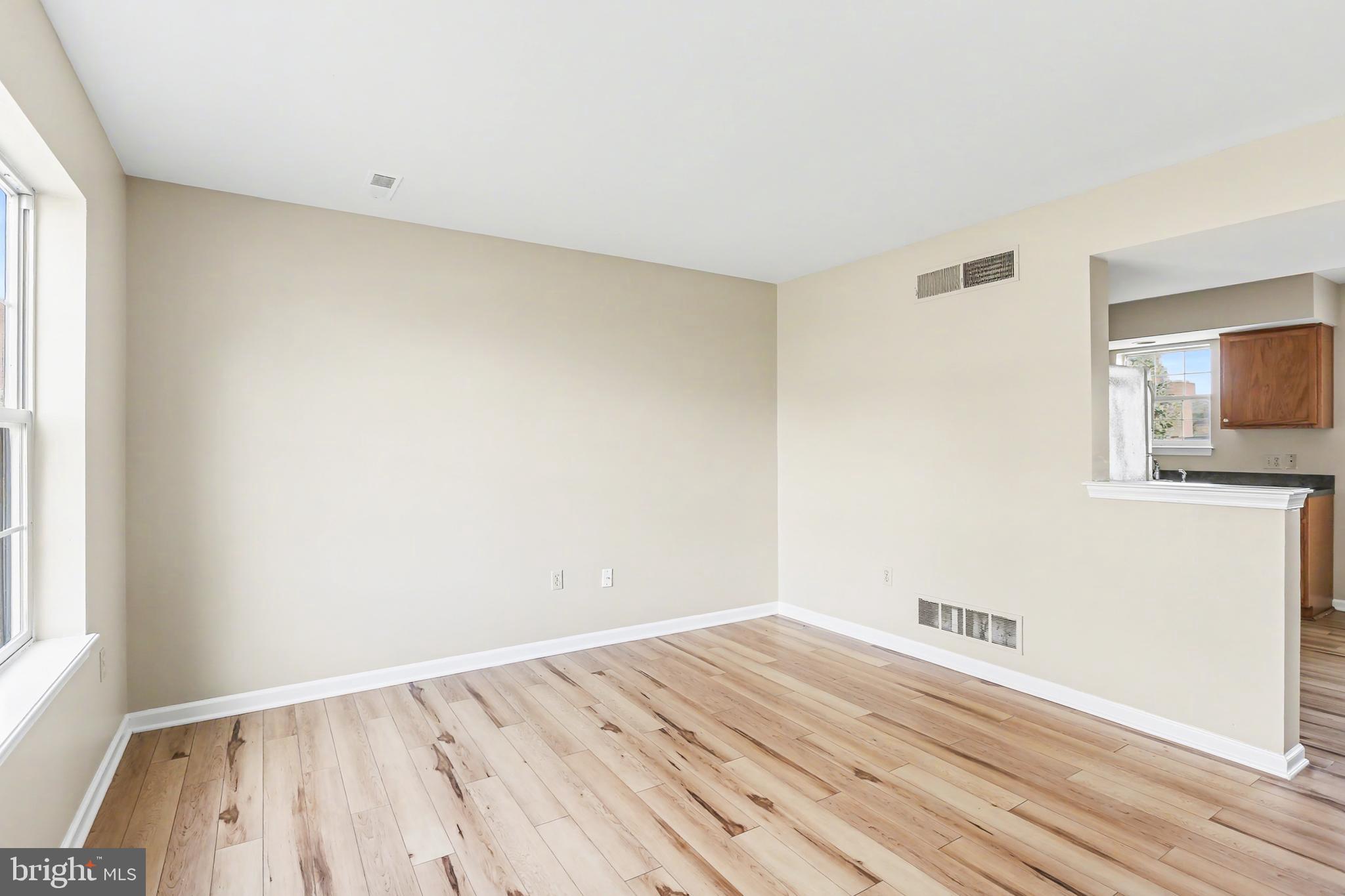 2949 Milky Way Dover, PA 17315 - Photo 3 of 10 a view of empty room with wooden floor and fan