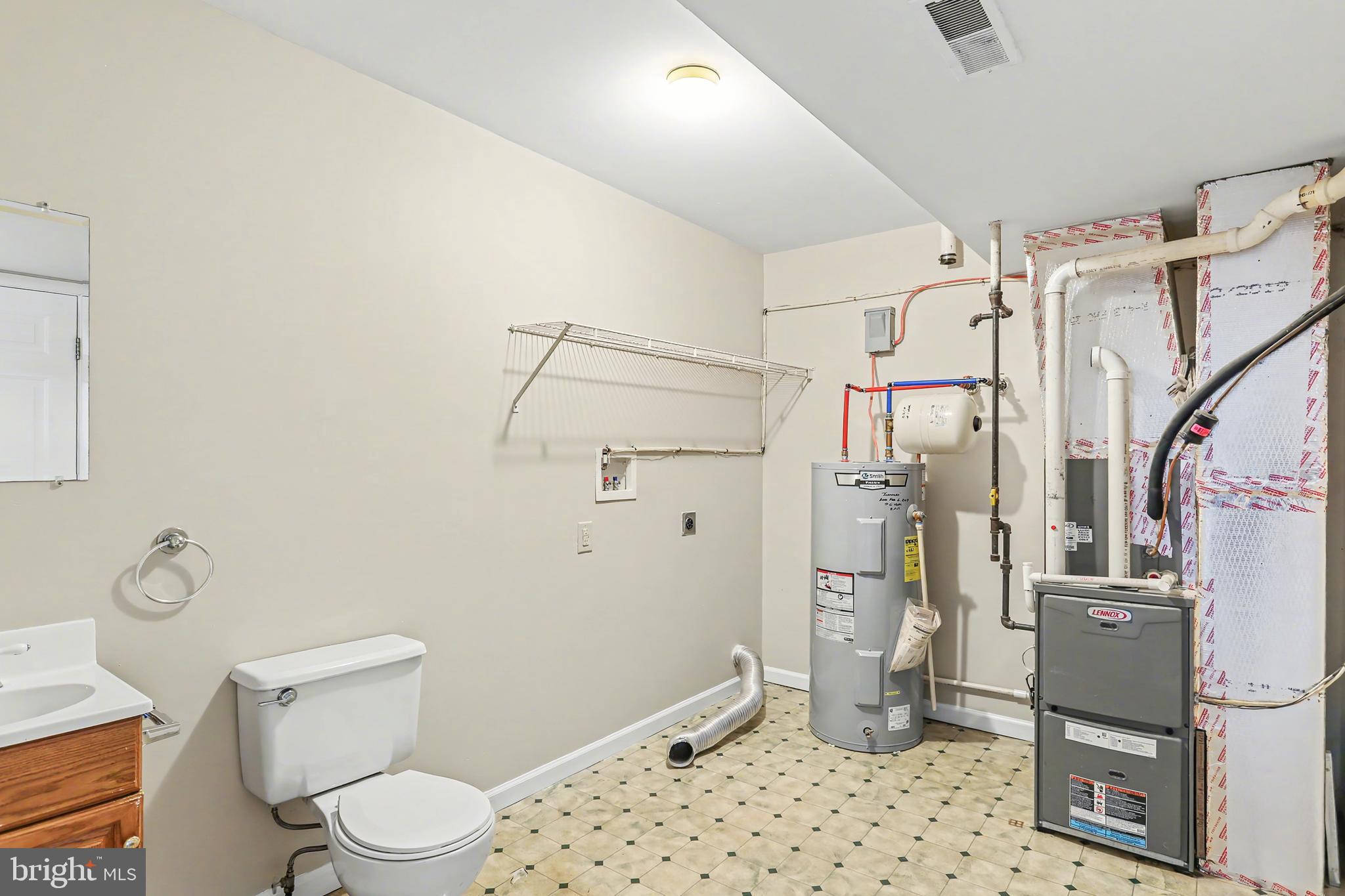 2949 Milky Way Dover, PA 17315 - Photo 6 of 10 a bathroom with a toilet sink and a shower