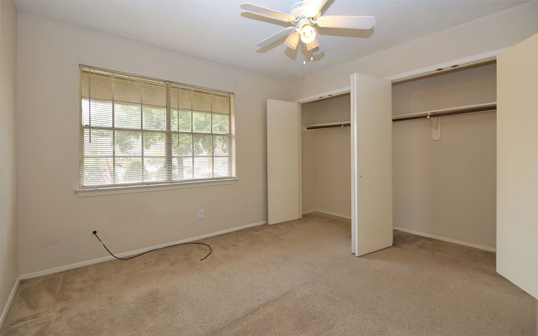 1433 Cedar Post Lane, Unit 27 Houston, TX 77055 - Photo 16 of 18 a view of an empty room with a window