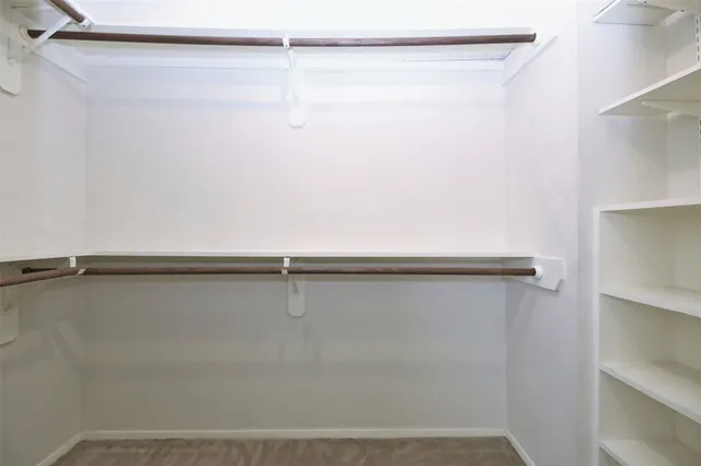 a view of a room with racks on the wall