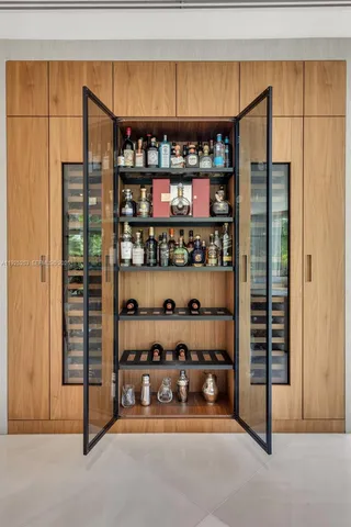 a bathroom with a double vanity sink toilet and shower