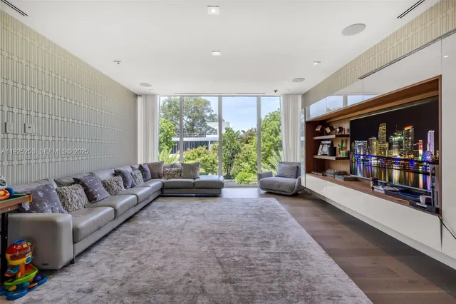 a view of a swimming pool with a yard