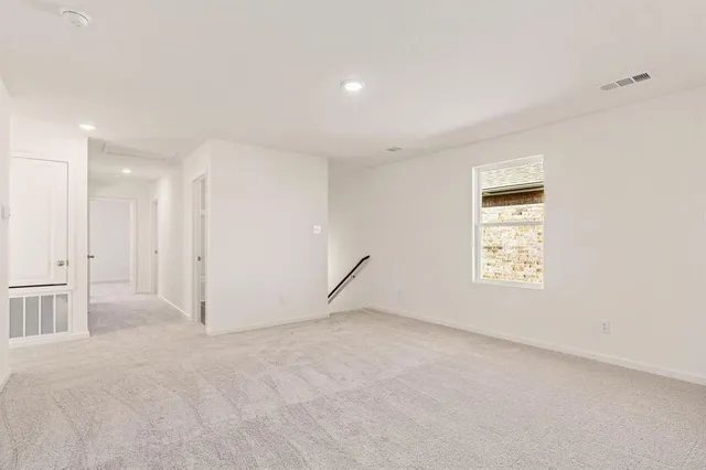 a view of an empty room with window