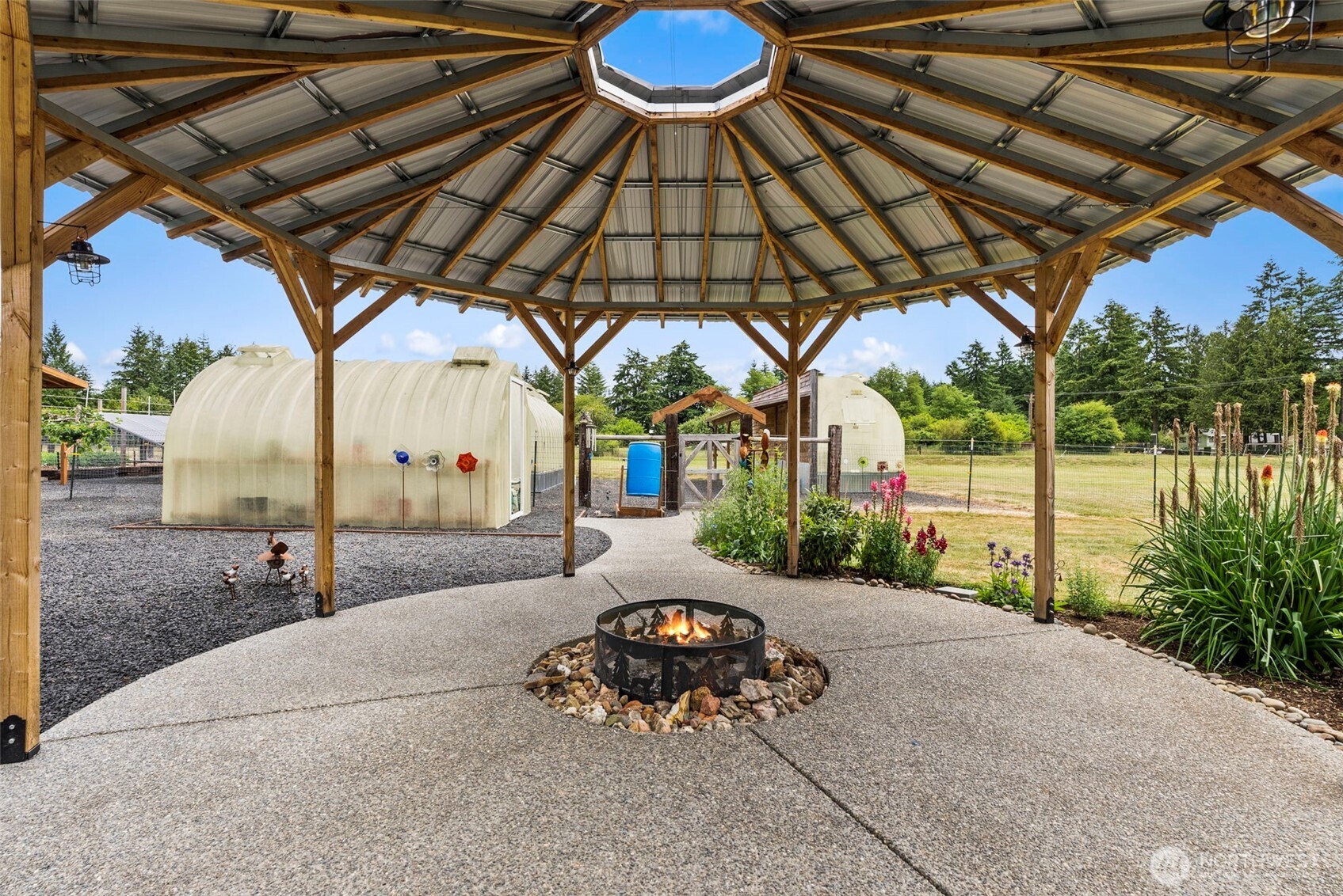 1241 Koontz Road Chehalis, WA 98532 - Photo 15 of 38 a backyard of a house with table and chairs
