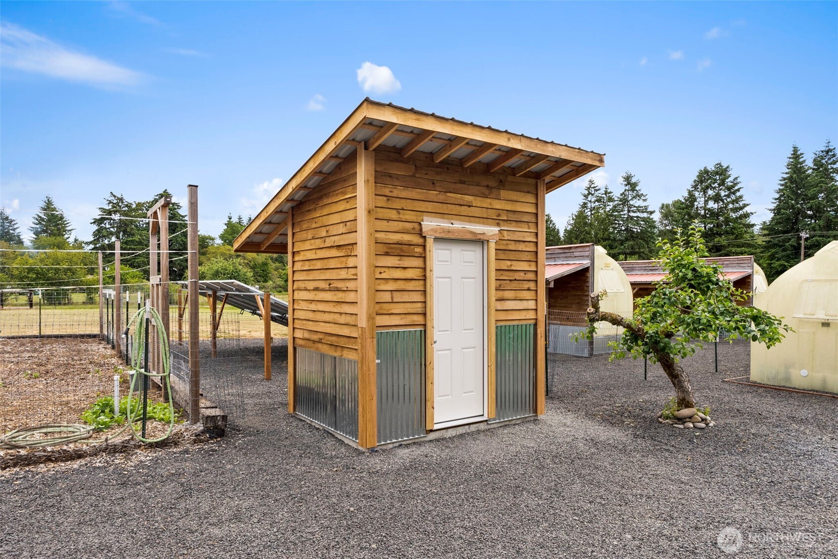 1241 Koontz Road Chehalis, WA 98532 - Photo 19 of 38 a backyard of a house with table and chairs
