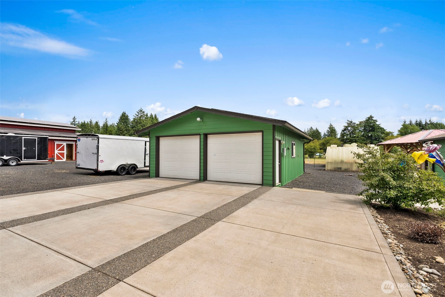 1241 Koontz Road Chehalis, WA 98532 - Photo 24 of 38 a front view of a house with a yard and garage