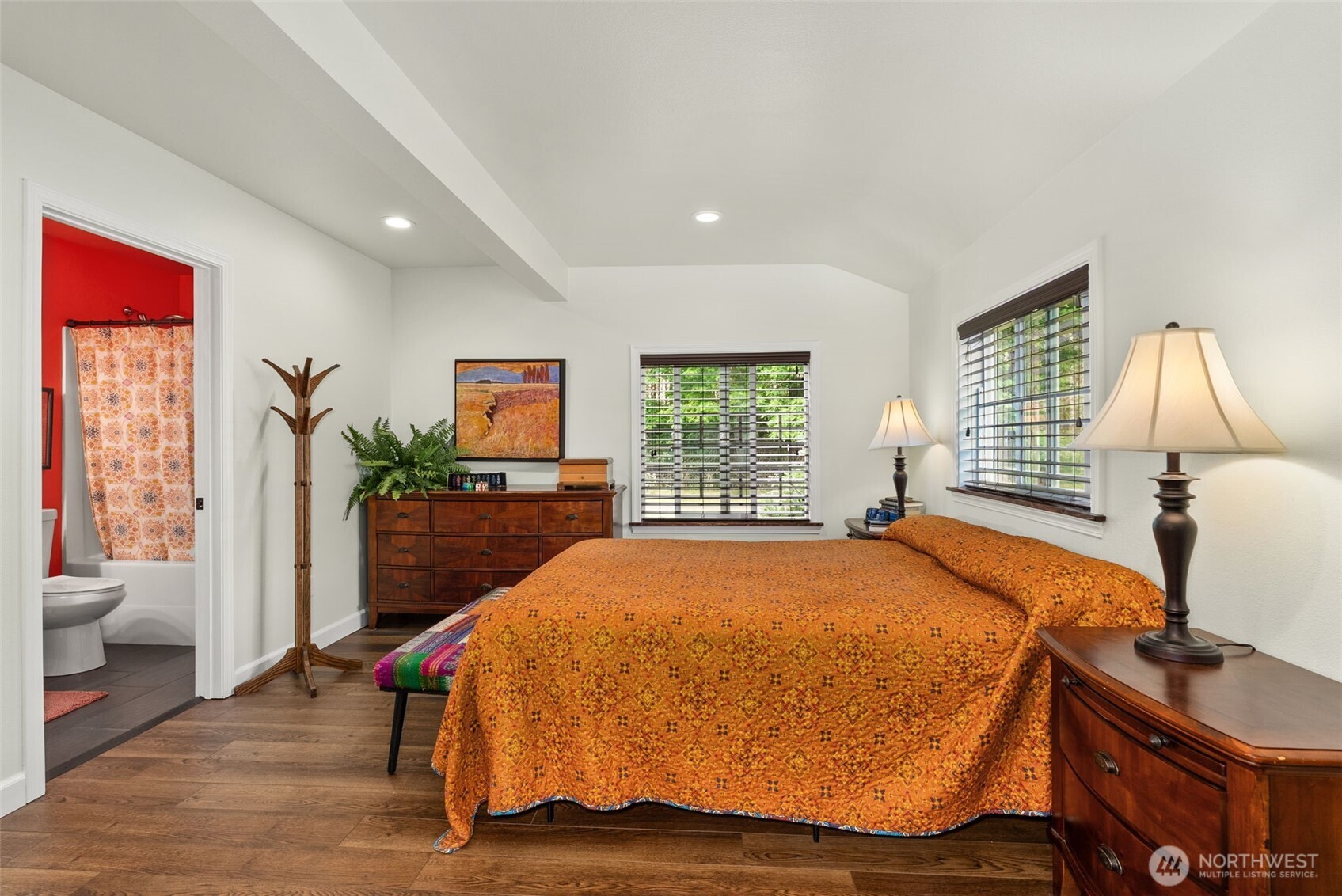 1241 Koontz Road Chehalis, WA 98532 - Photo 32 of 38 a bedroom with a bed and wooden floor