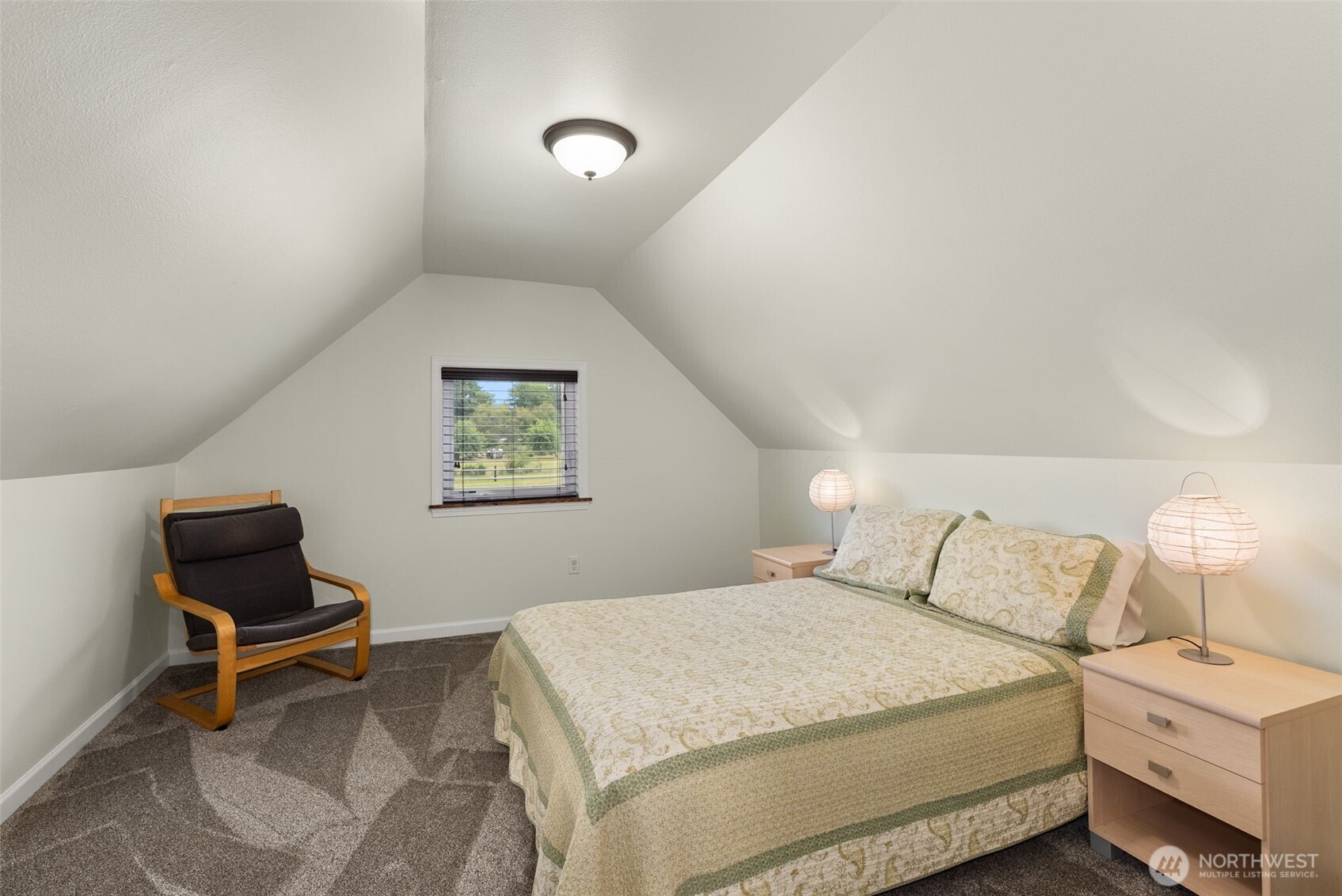 1241 Koontz Road Chehalis, WA 98532 - Photo 38 of 38 a bedroom with a bed and chair