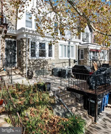 a front view of a building with street view