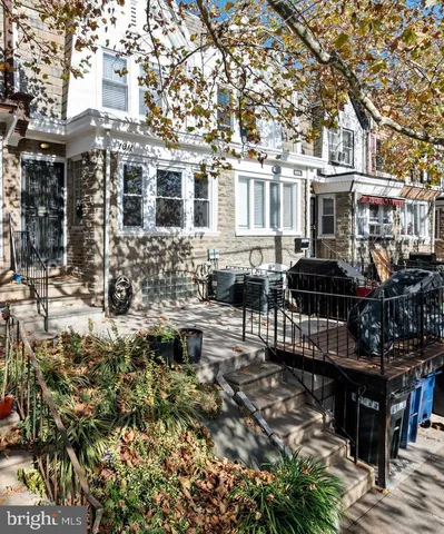 a front view of a building with street view