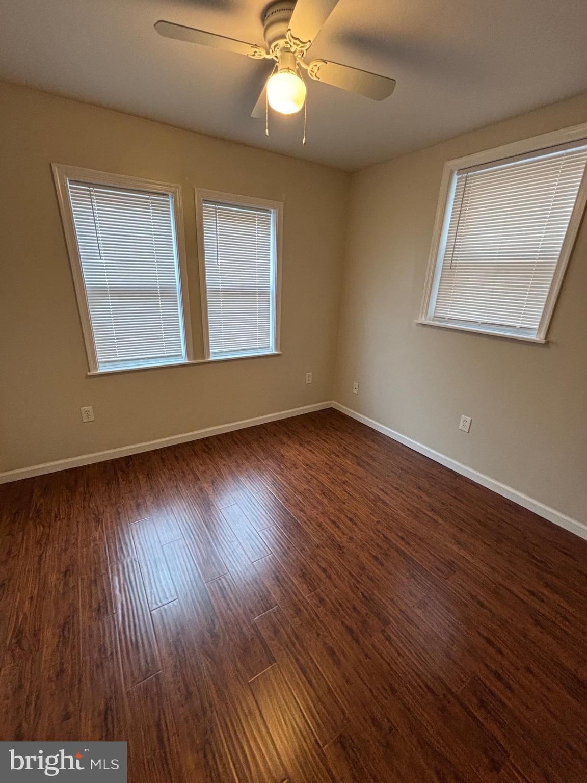 1911 72nd Avenue Philadelphia, PA 19138 - Photo 11 of 27 a view of an empty room with wooden floor and a window