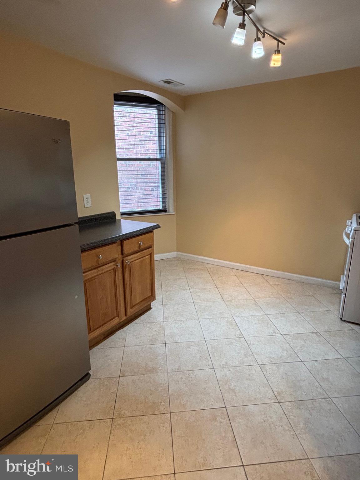 1911 72nd Avenue Philadelphia, PA 19138 - Photo 19 of 27 a view of kitchen with granite countertop cabinets and outdoor space