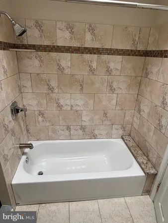 a bathroom with a bathtub