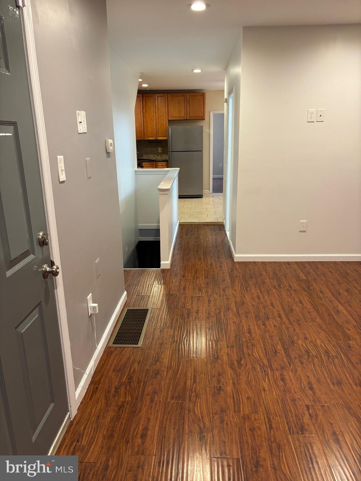 1911 72nd Avenue Philadelphia, PA 19138 - Photo 9 of 27 a view of a livingroom with wooden floor and staircase