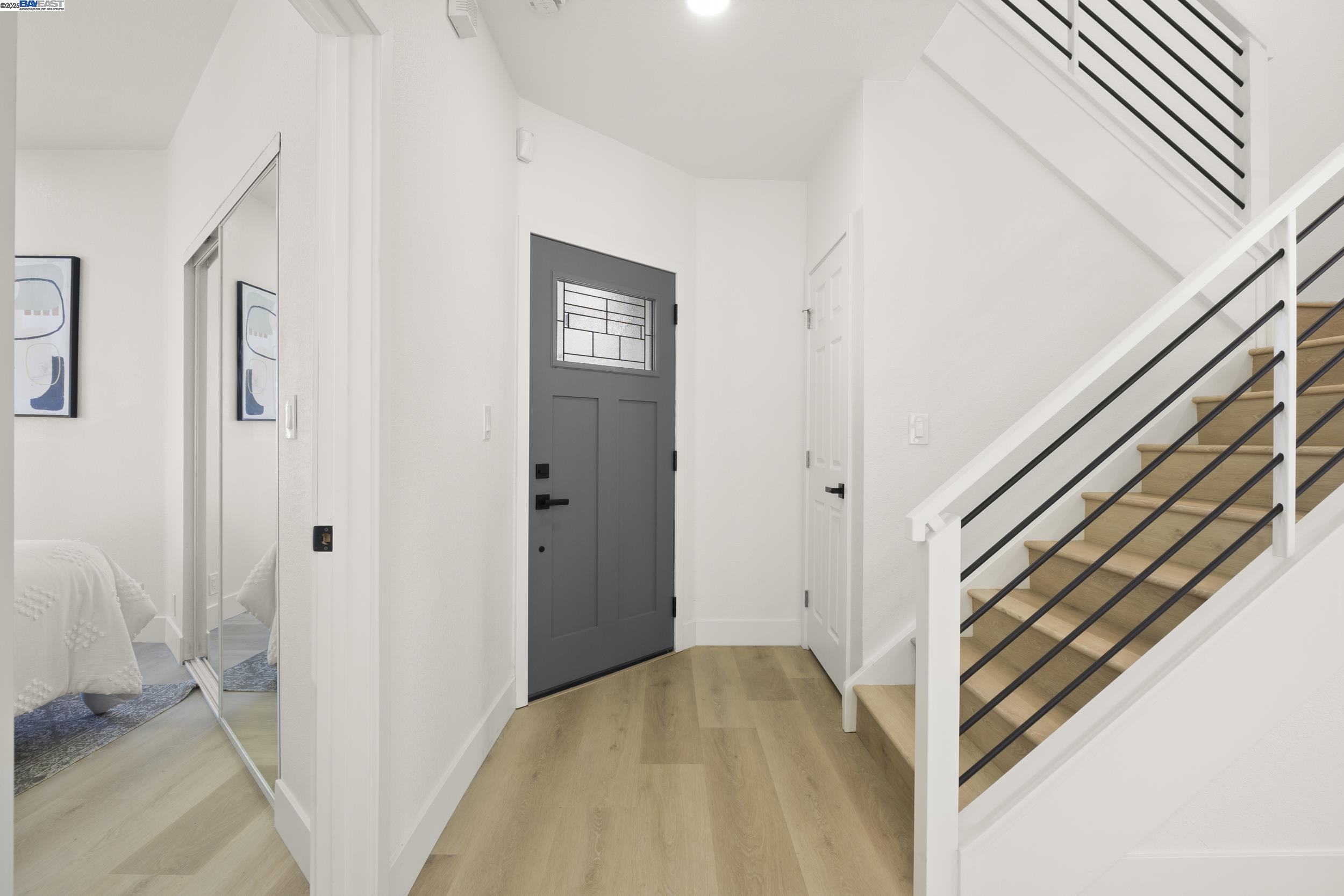 6453 Potrero Drive Newark, CA 94560 - Photo 12 of 34 a view of a hallway with wooden floor and entryway