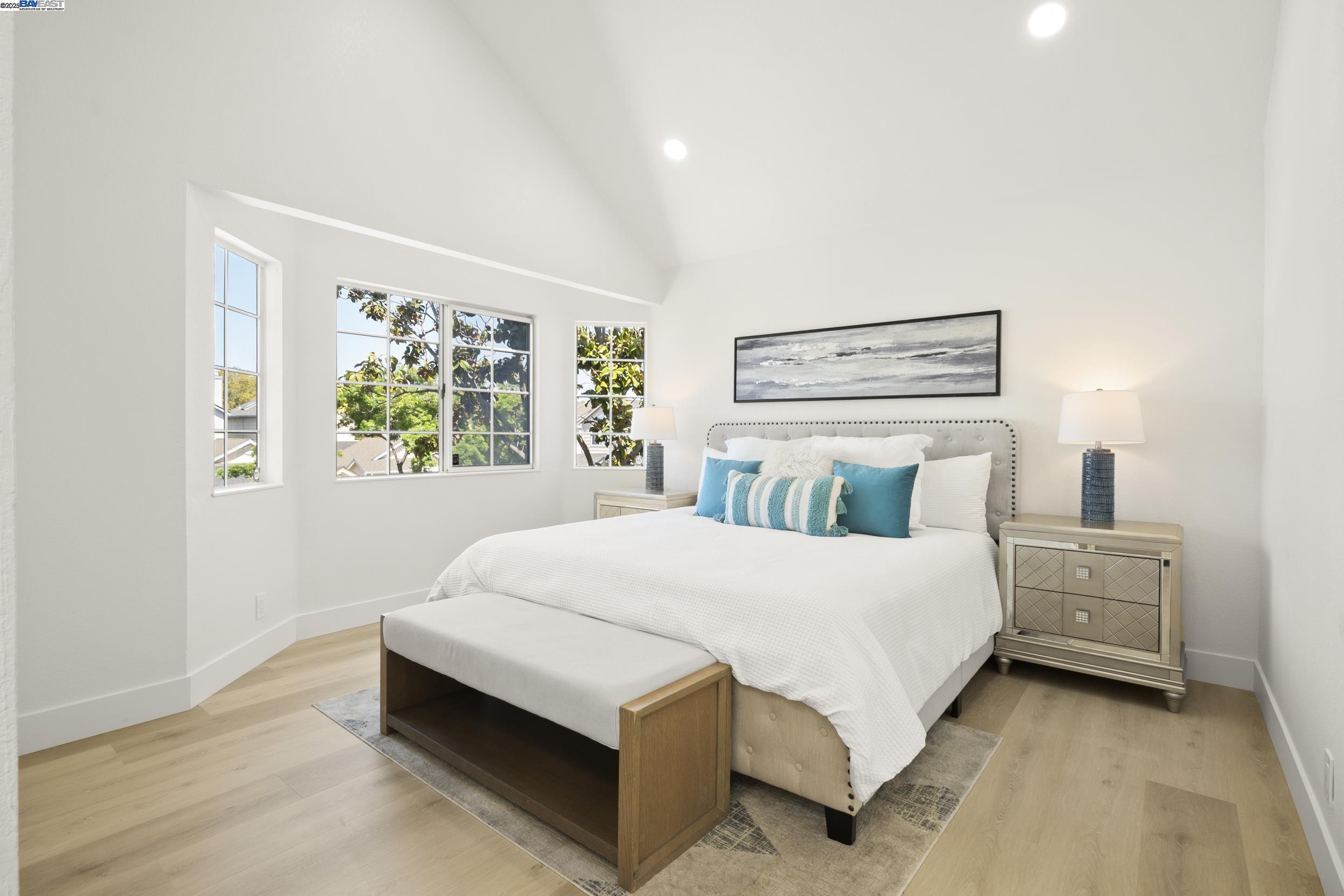 6453 Potrero Drive Newark, CA 94560 - Photo 16 of 34 a bedroom with a bed lamp and window