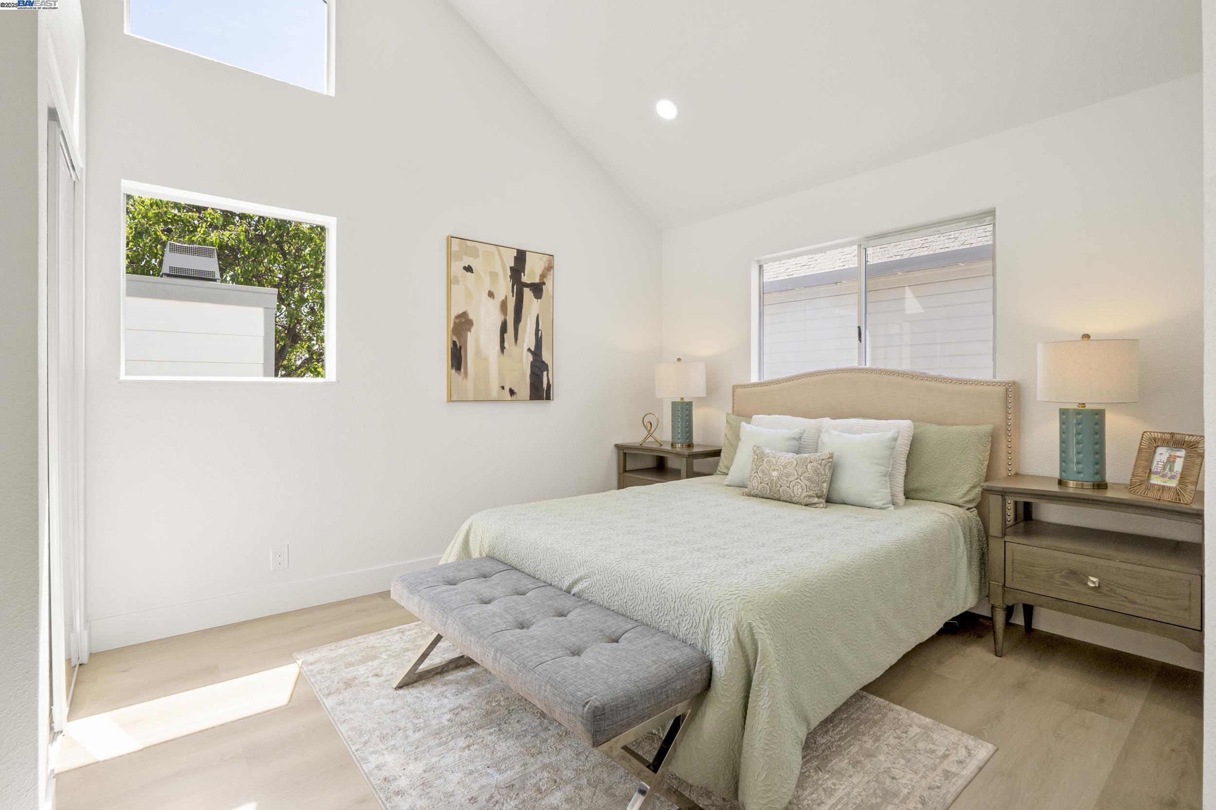 6453 Potrero Drive Newark, CA 94560 - Photo 20 of 34 a bedroom with a bed and a window