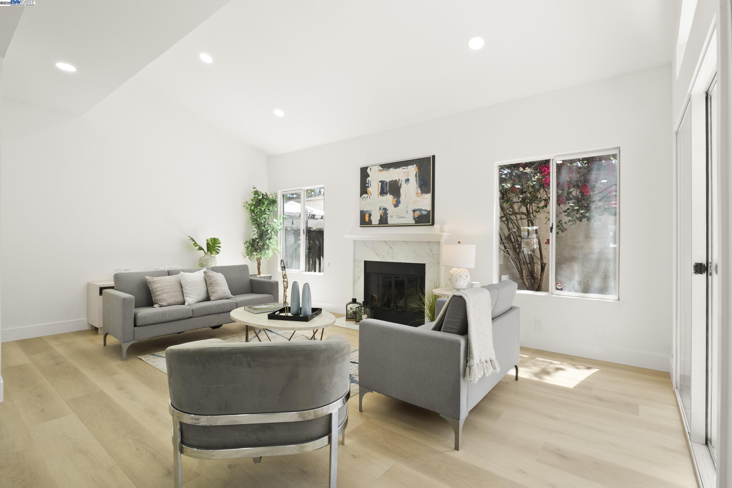 6453 Potrero Drive Newark, CA 94560 - Photo 2 of 34 a living room with furniture and a fireplace