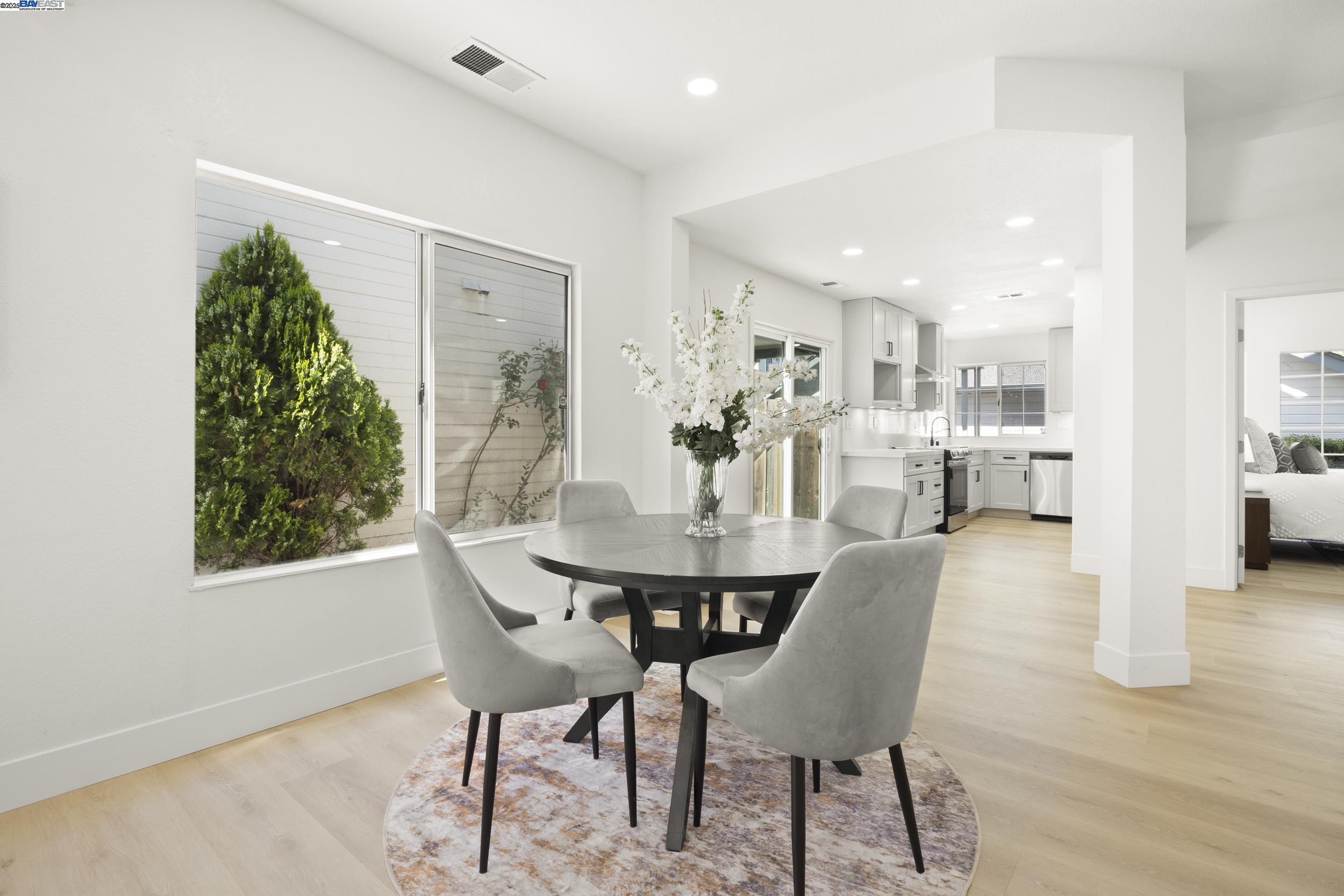 6453 Potrero Drive Newark, CA 94560 - Photo 7 of 34 a view of a dining room with furniture and wooden floor