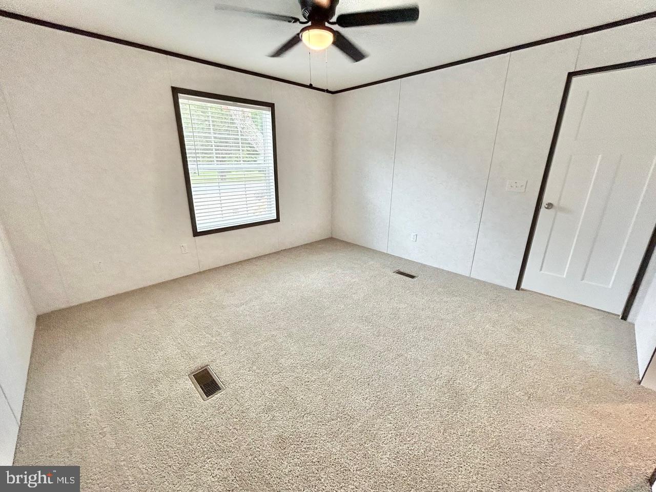 7086 James Moore Road Port Norris, NJ 08349 - Photo 11 of 22 view of an empty room with a window