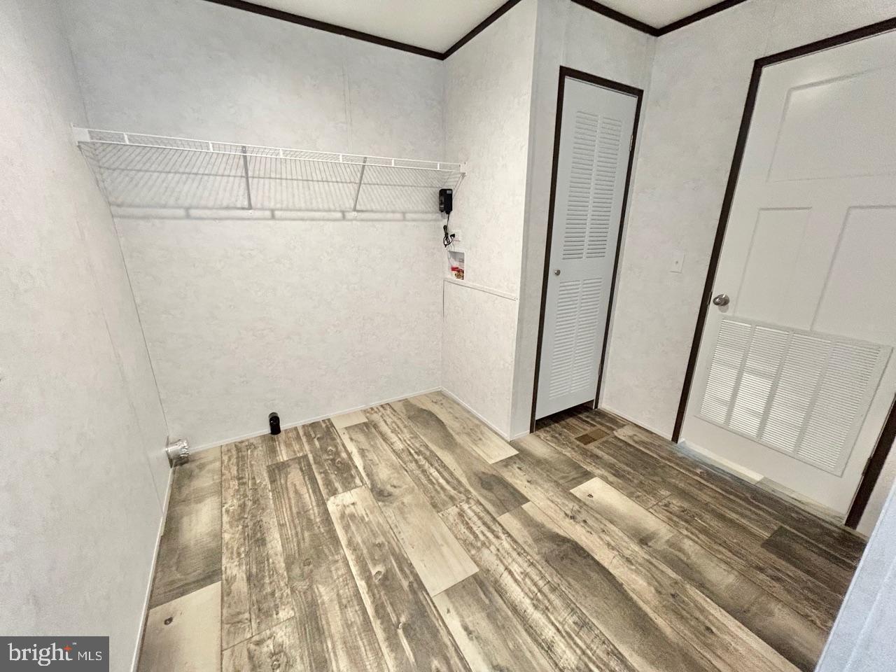 7086 James Moore Road Port Norris, NJ 08349 - Photo 14 of 22 a view of a room with wooden floor