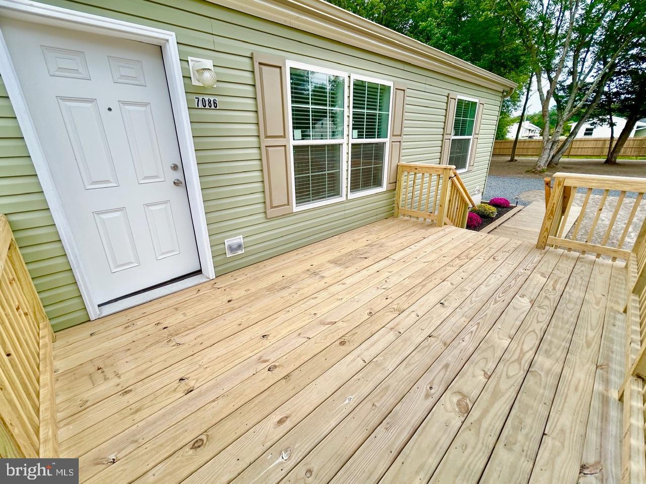 7086 James Moore Road Port Norris, NJ 08349 - Photo 18 of 22 a view of a house with a backyard