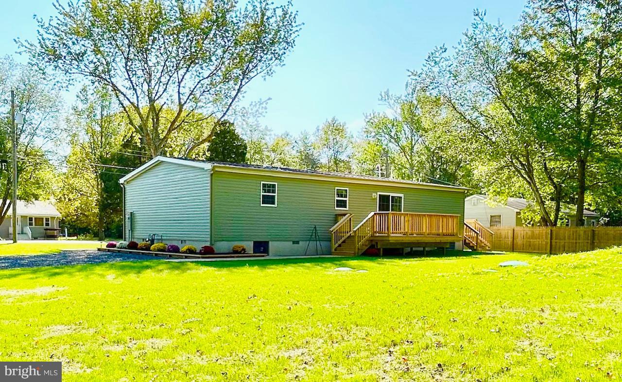 7086 James Moore Road Port Norris, NJ 08349 - Photo 21 of 22 a view of yard with swimming pool and trees
