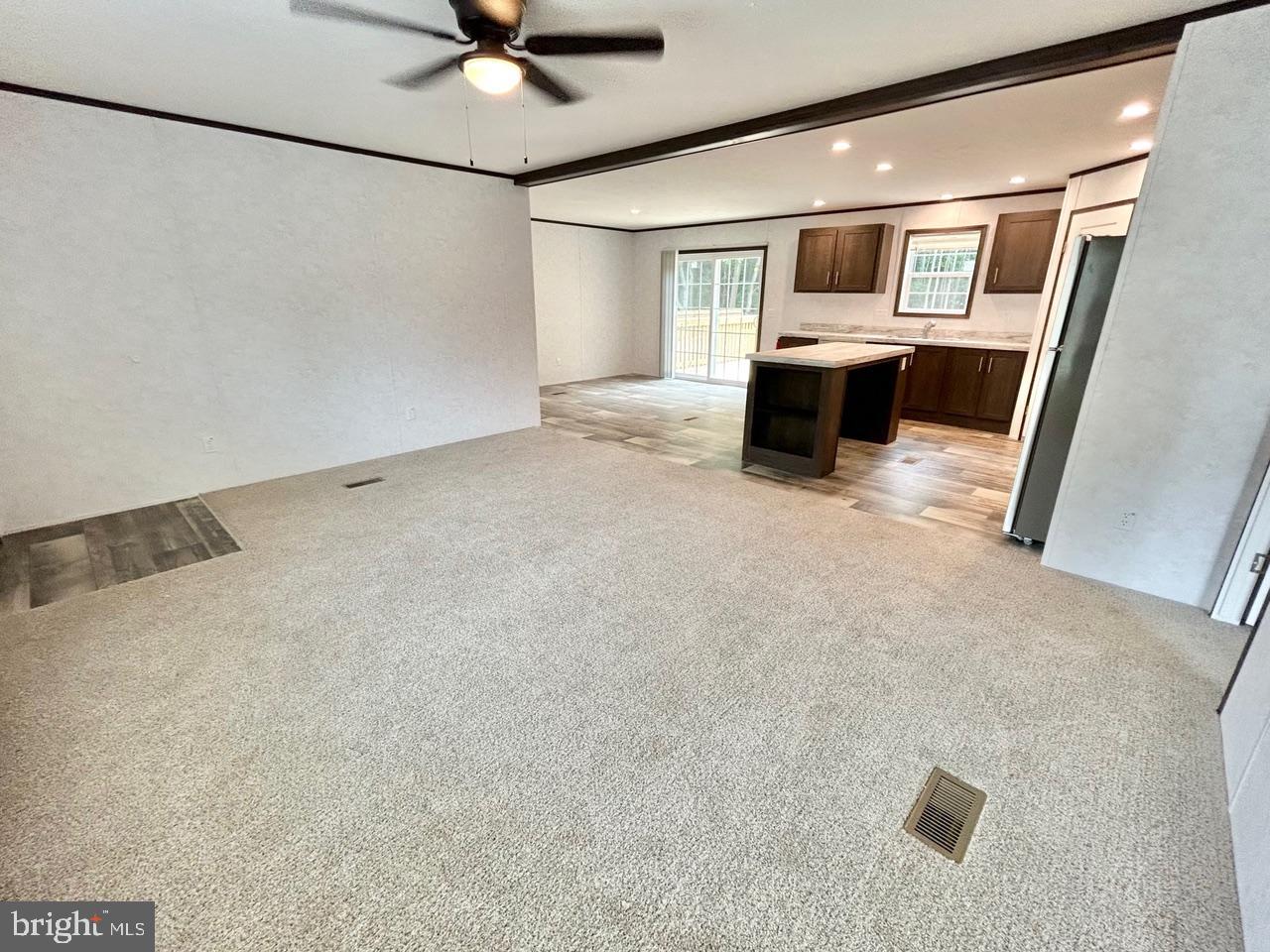 7086 James Moore Road Port Norris, NJ 08349 - Photo 6 of 22 a view of living room with furniture and window