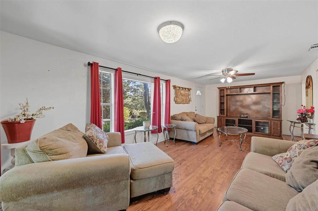 3334 Sheldon Avenue Dallas, TX 75211 - Photo 13 of 22 Living room with wood finished floors and a ceiling fan