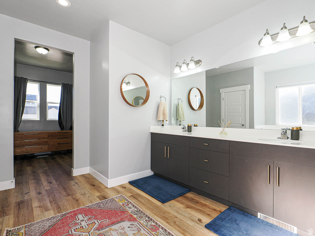 2487 Canyon Wild Road, Unit 413 Draper, UT 84020 - Photo 36 of 75 Full bathroom featuring double vanity, light wood-style floors, and recessed lighting