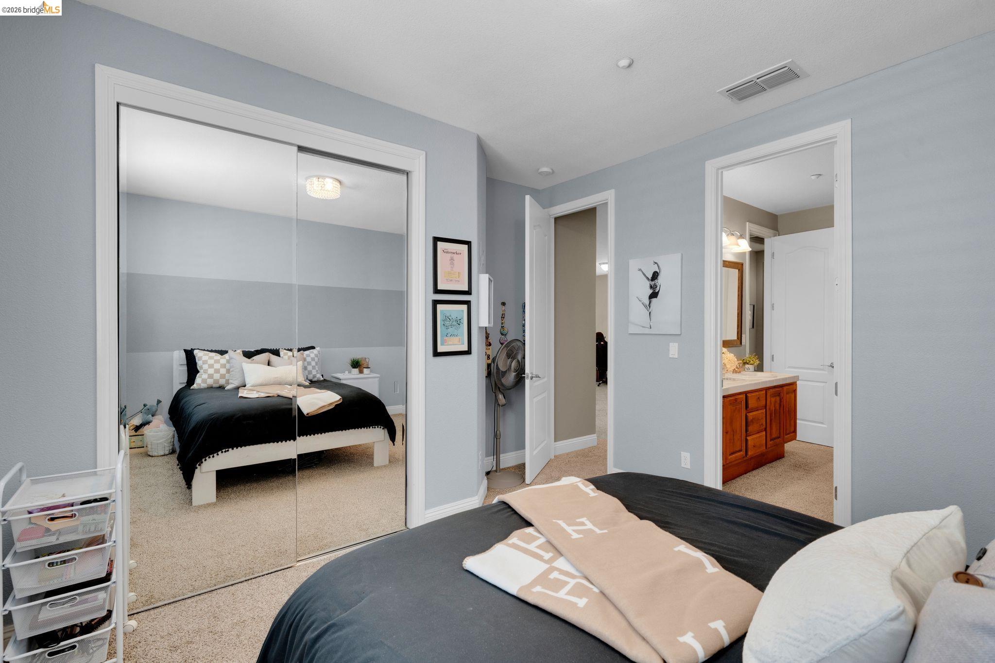 2513 Winged Foot Road Brentwood, CA 94513 - Photo 27 of 45 Room featuring light blue walls and carpeted flooring