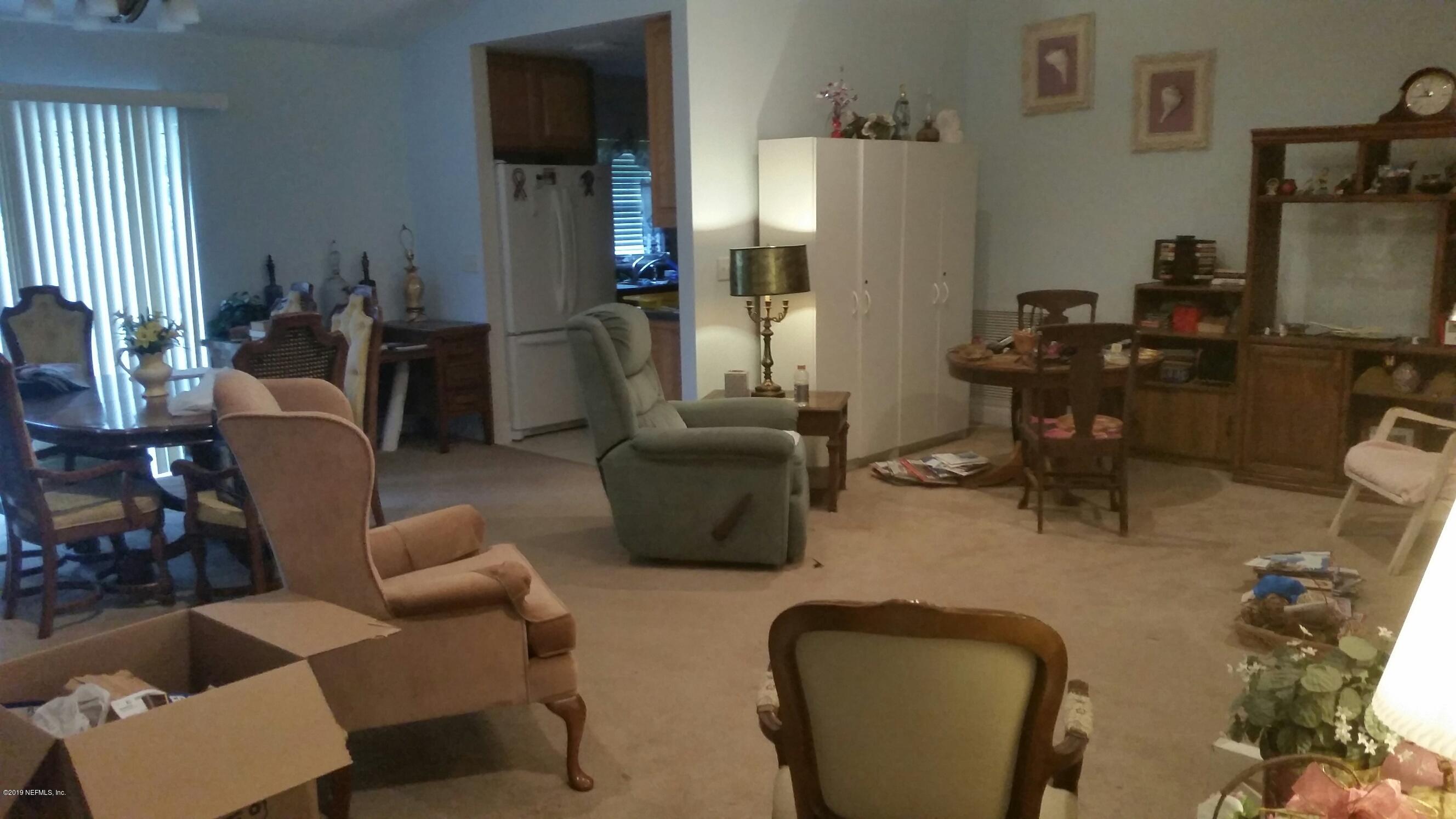 115 Pique Road Crescent City, FL 32112 - Photo 3 of 15 115- Living Rm. 2