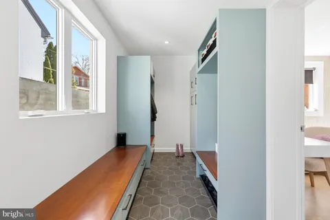 a view of a hallway with windows