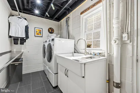 a utility room with dryer and washer