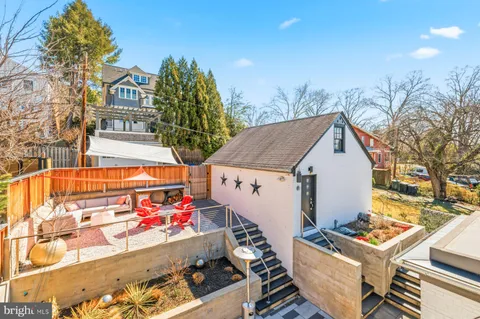 a view of a chairs and table in the terrace