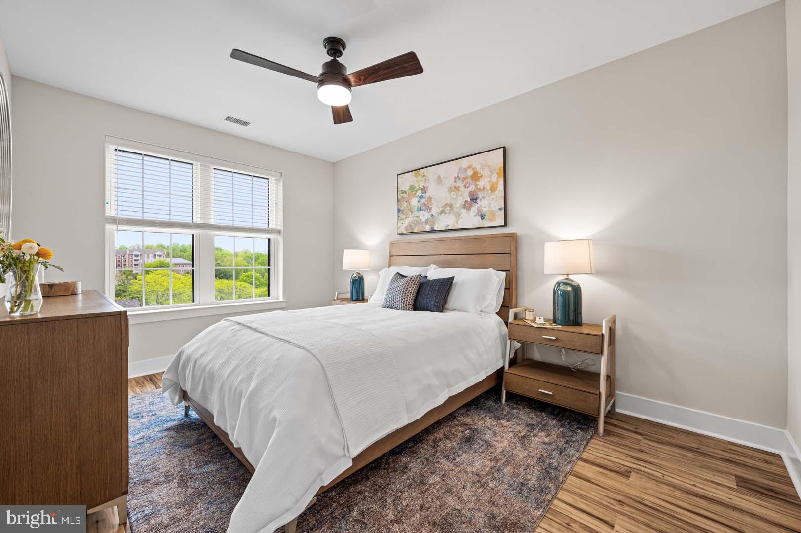 703 Rice Boulevard, Unit 103 Exton, PA 19341 - Photo 5 of 10 Serene bedroom with natural light.