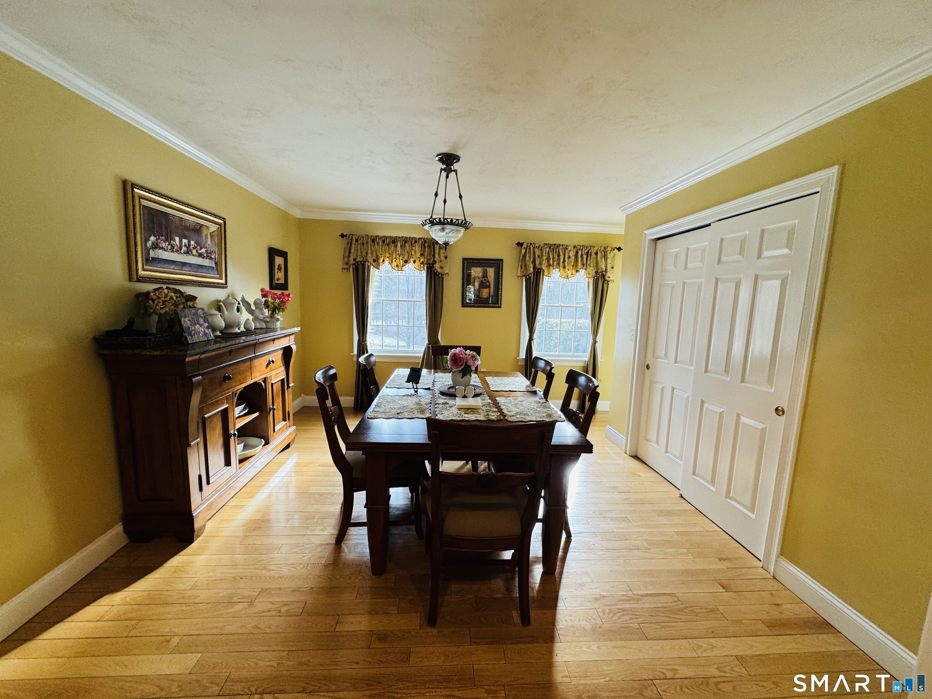1350 Thompson Road Thompson, CT 06277 - Photo 12 of 39 a view of a a dining room with furniture window and wooden floor