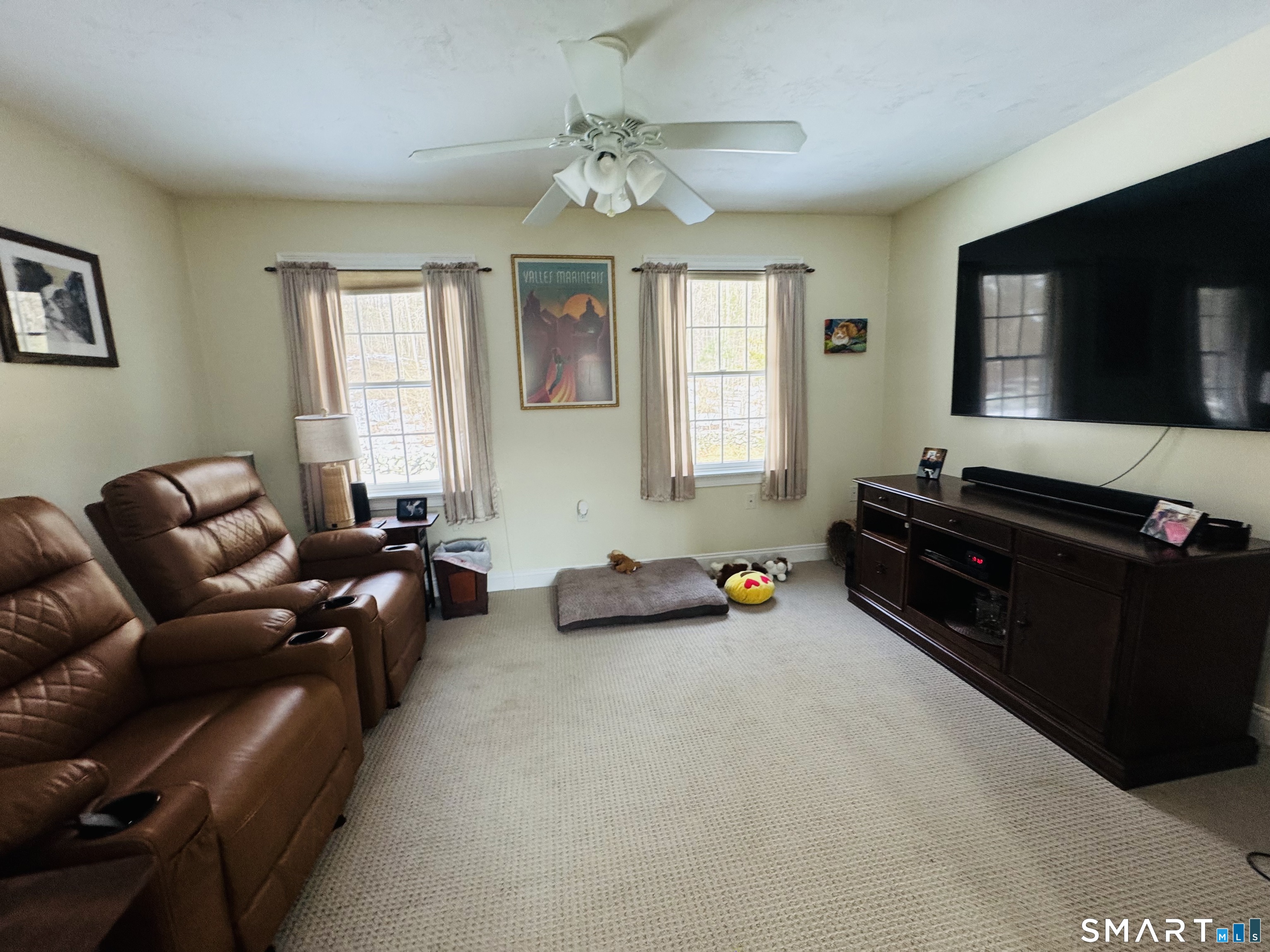 1350 Thompson Road Thompson, CT 06277 - Photo 14 of 39 a living room with furniture and a flat screen tv
