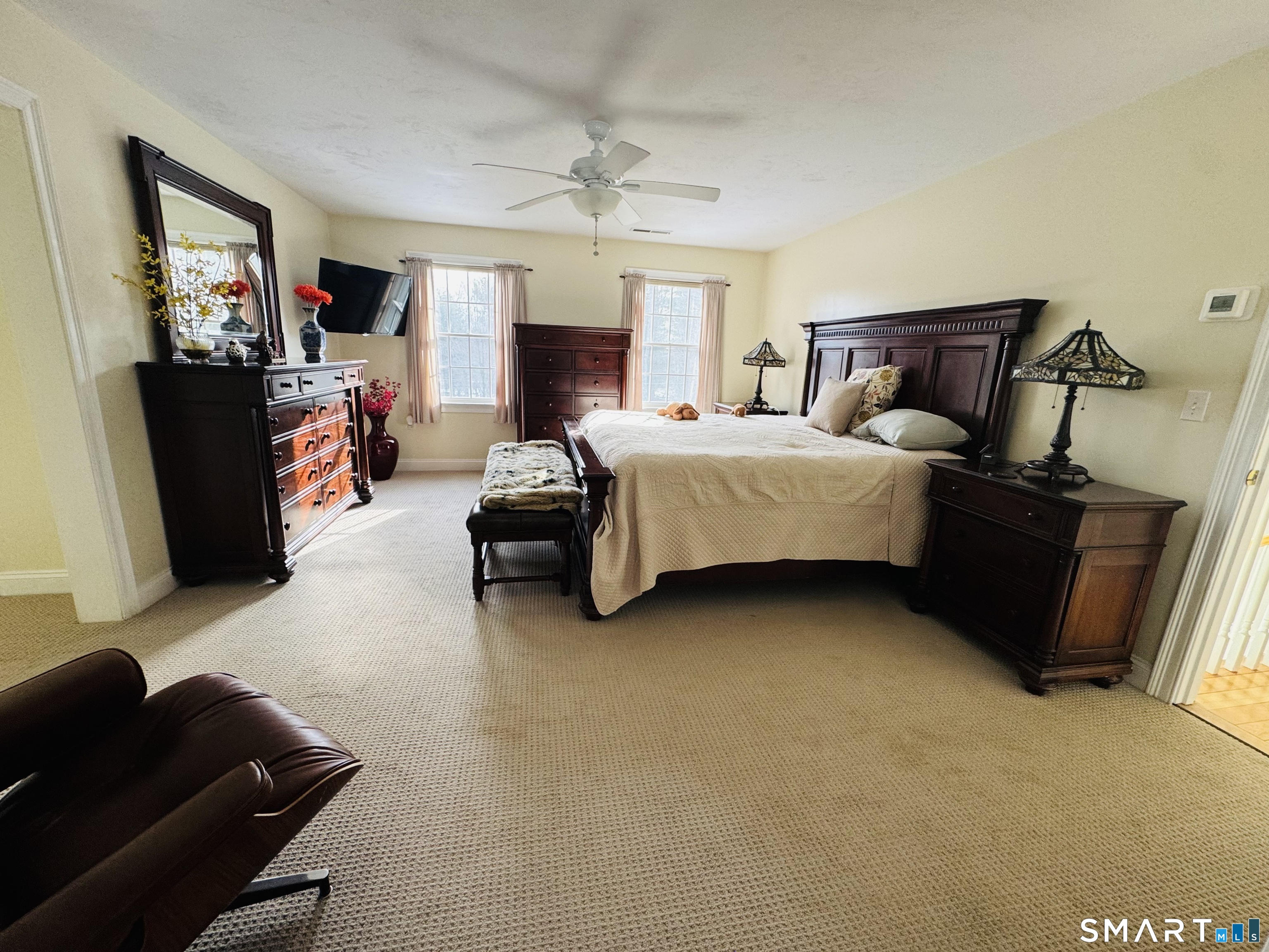 1350 Thompson Road Thompson, CT 06277 - Photo 15 of 39 a spacious bedroom with a bed and furniture