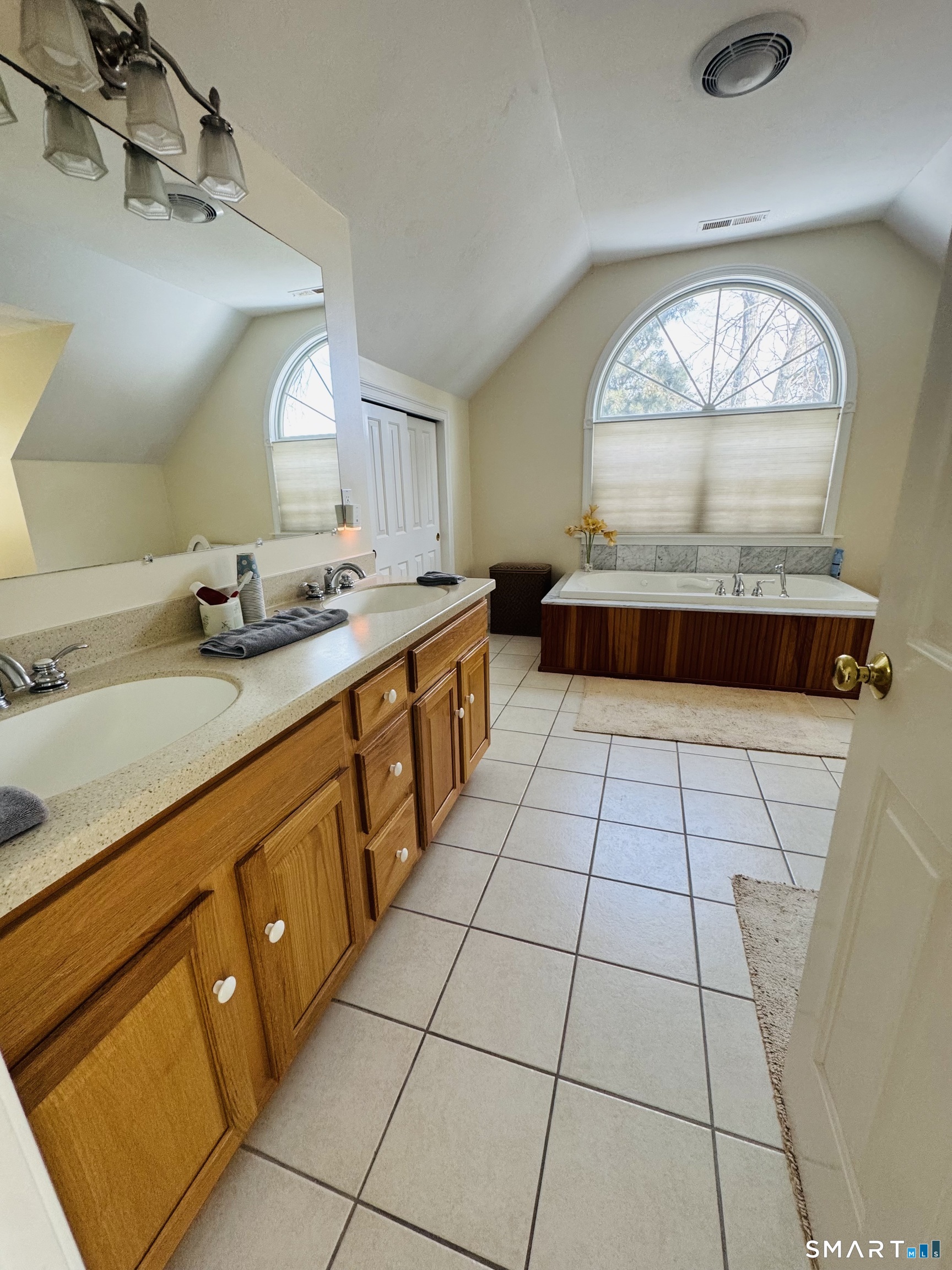 1350 Thompson Road Thompson, CT 06277 - Photo 16 of 39 a kitchen with stainless steel appliances a sink a stove a microwave and cabinets