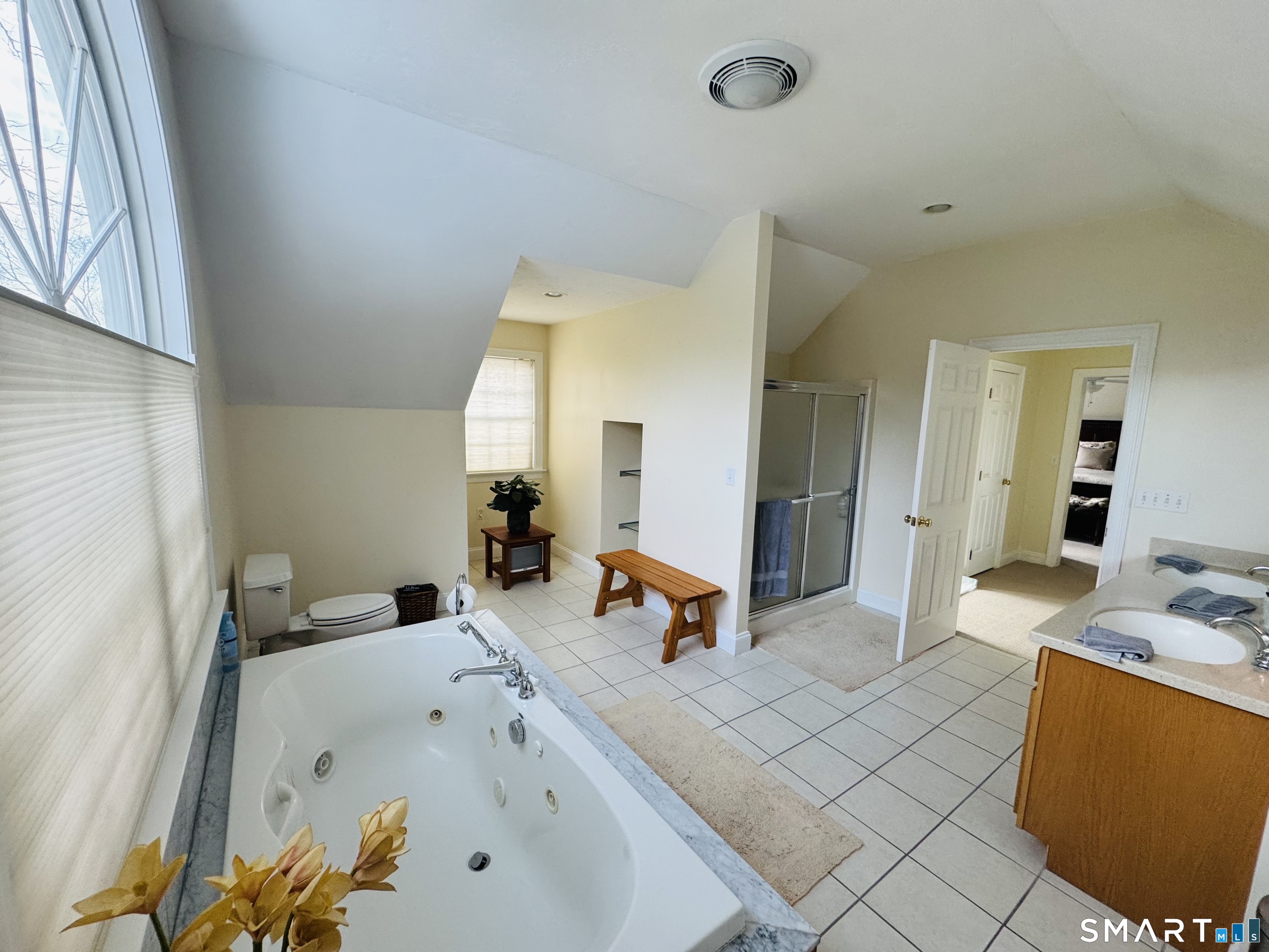 1350 Thompson Road Thompson, CT 06277 - Photo 18 of 39 a bathroom with a tub sink and mirror