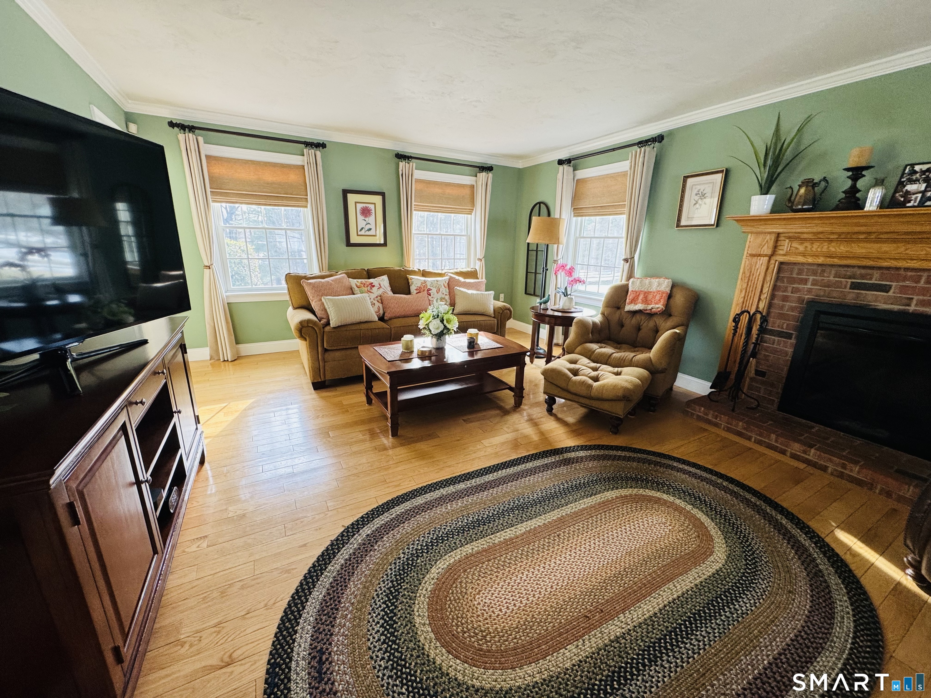 1350 Thompson Road Thompson, CT 06277 - Photo 26 of 39 a living room with furniture and a flat screen tv