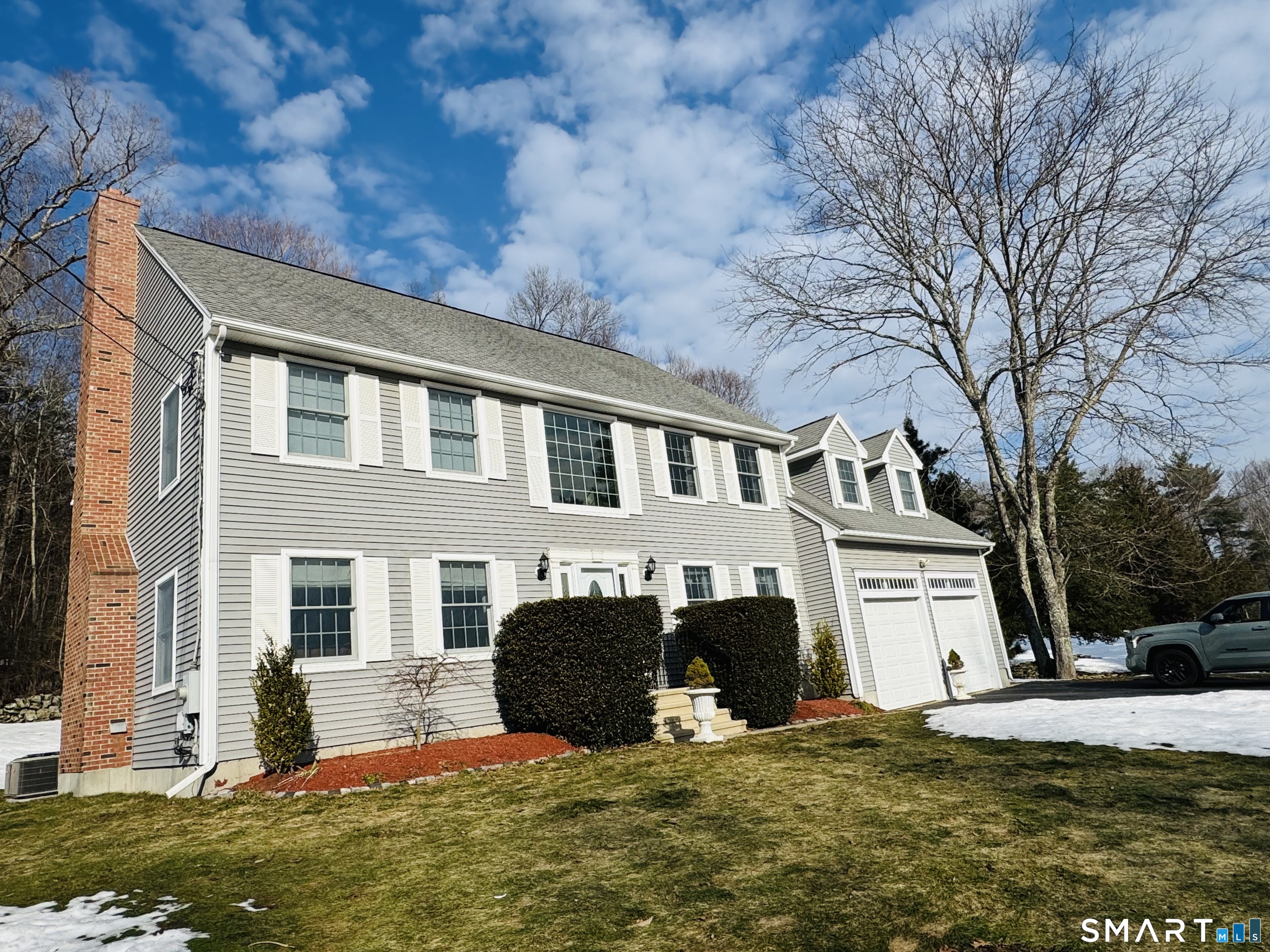 1350 Thompson Road Thompson, CT 06277 - Photo 28 of 39 a front view of house with yard and trees in the background
