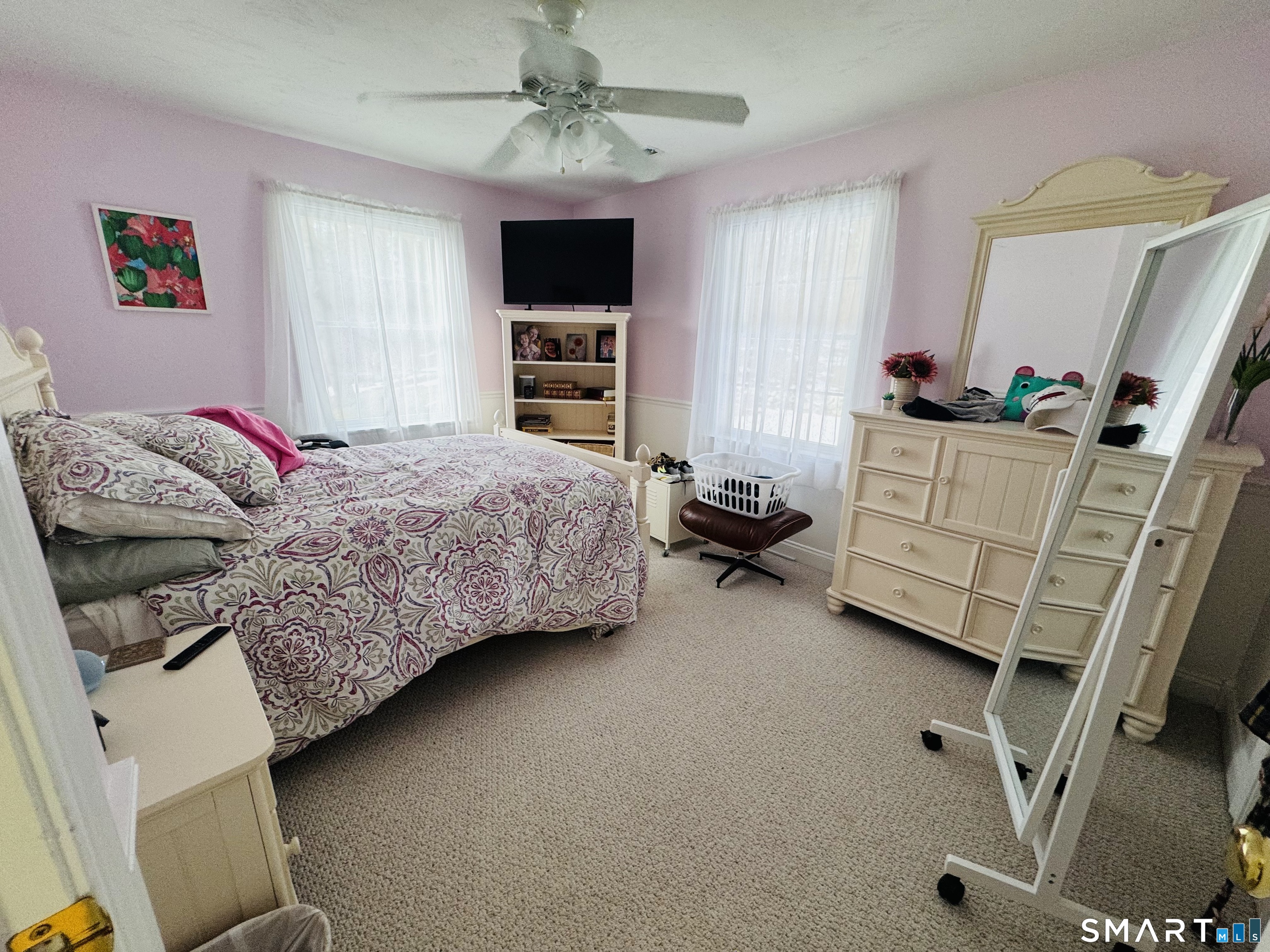 1350 Thompson Road Thompson, CT 06277 - Photo 32 of 39 a bedroom with a bed and a television in it