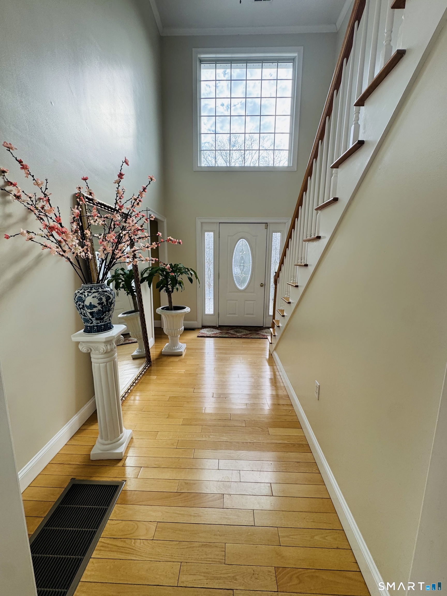 1350 Thompson Road Thompson, CT 06277 - Photo 6 of 39 a view of entryway and hall with wooden floor