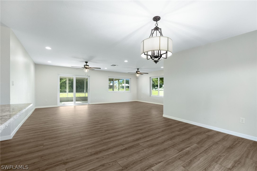 1453 River Road Moore Haven, FL 33471 - Photo 14 of 39 a view of an empty room with wooden floor and a window