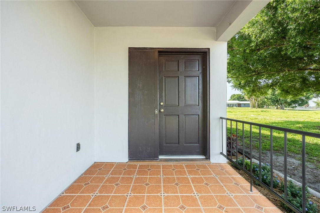 1453 River Road Moore Haven, FL 33471 - Photo 2 of 39 a view of an entryway door