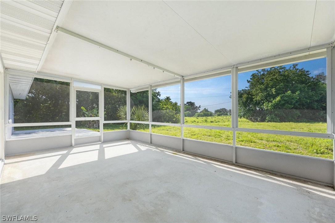 1453 River Road Moore Haven, FL 33471 - Photo 27 of 39 a view of an empty room with a balcony