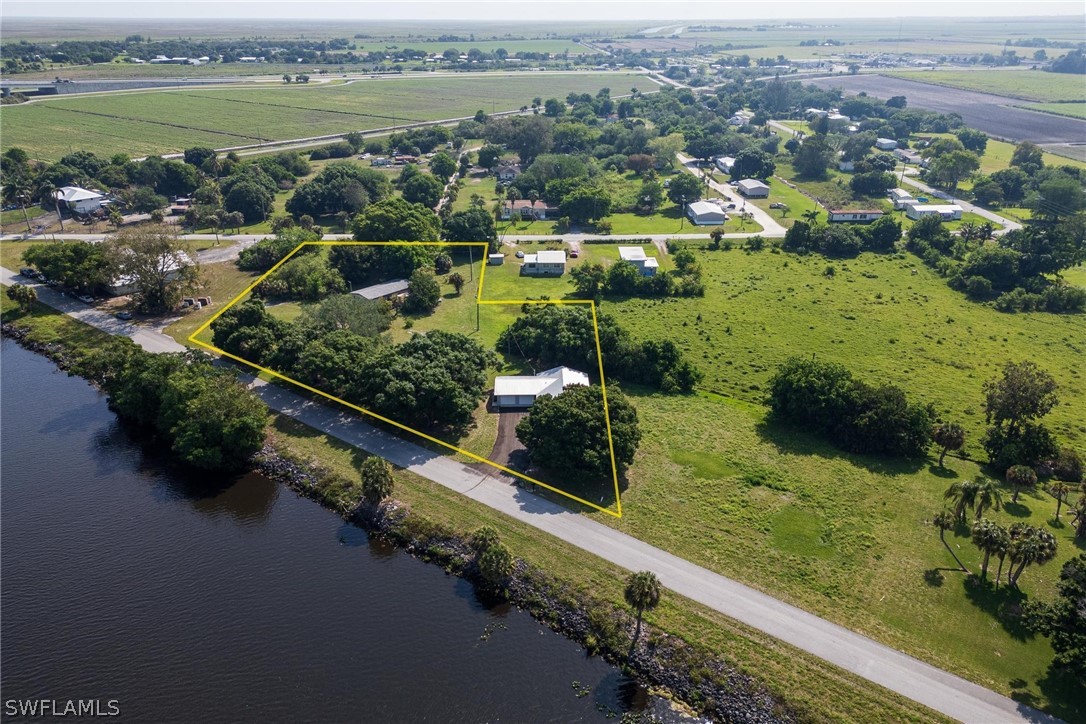 1453 River Road Moore Haven, FL 33471 - Photo 34 of 39 a view of a lake with a city