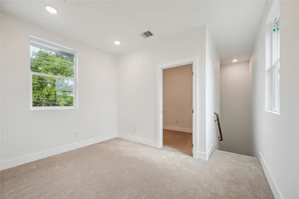 a view of yard with swimming pool and green space